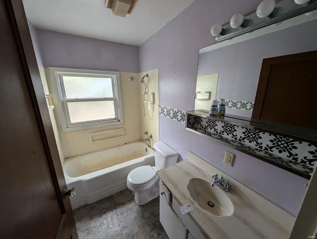 full bathroom featuring vanity, toilet, and tub / shower combination