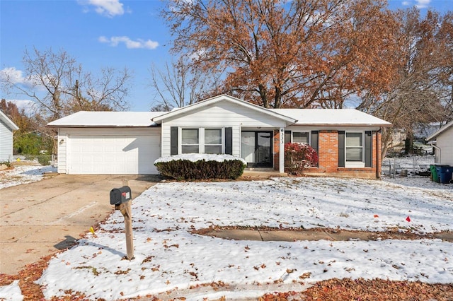 single story home featuring a garage