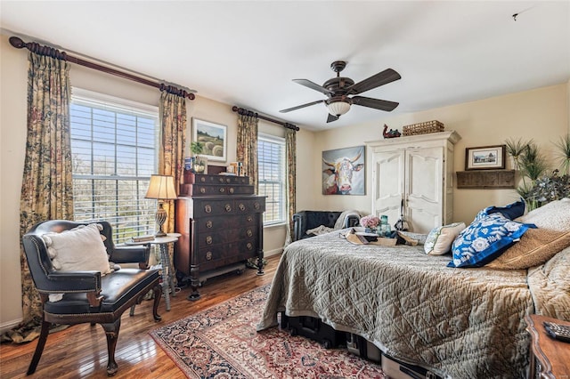 bedroom featuring hardwood / wood-style floors and ceiling fan