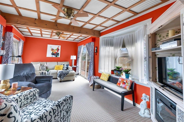 living room with carpet, beam ceiling, and ceiling fan