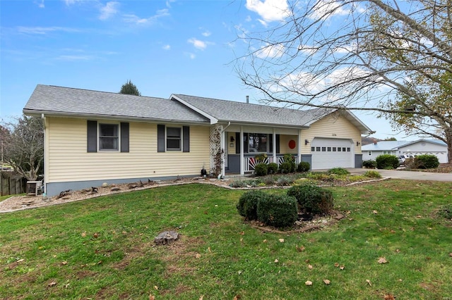 ranch-style home with a porch, a garage, and a front yard