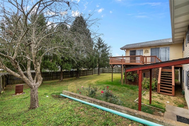 view of yard with a wooden deck