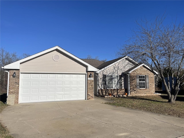 single story home featuring a garage