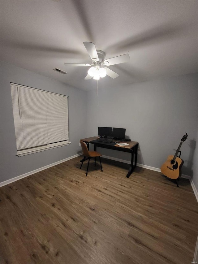 office featuring ceiling fan and dark hardwood / wood-style floors