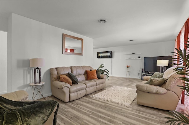 living room with light wood-type flooring