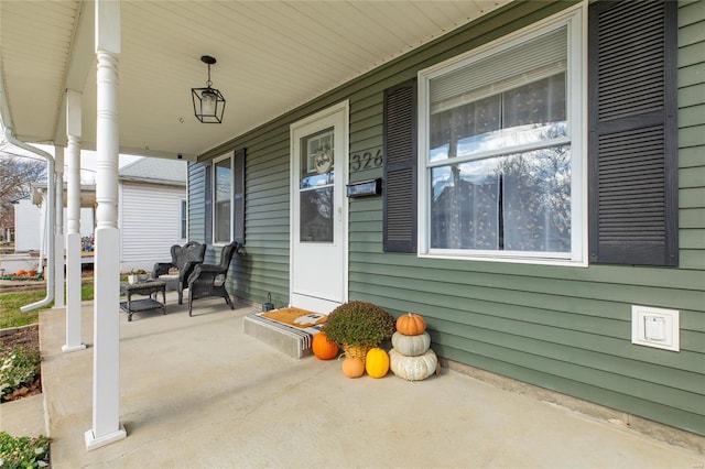 view of patio featuring a porch