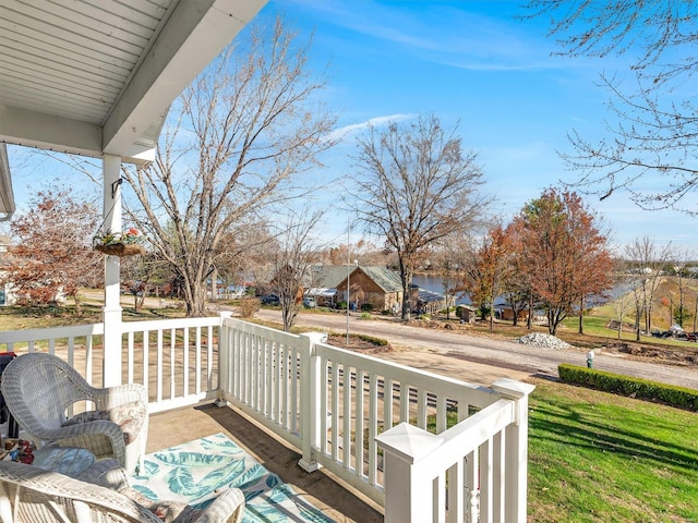 wooden terrace with covered porch