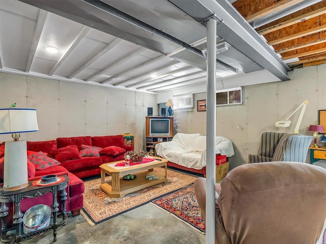 living room featuring concrete flooring