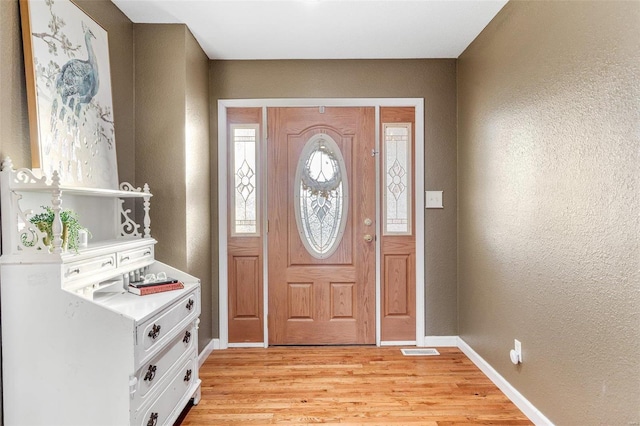 entryway featuring light wood-type flooring