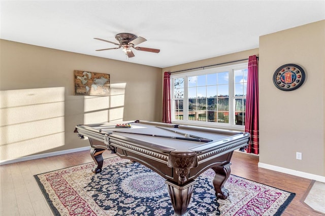 recreation room featuring hardwood / wood-style floors, ceiling fan, and pool table