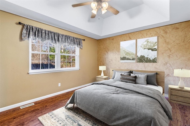 bedroom with ceiling fan and wood-type flooring