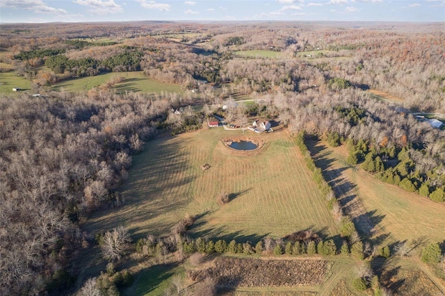 birds eye view of property with a rural view