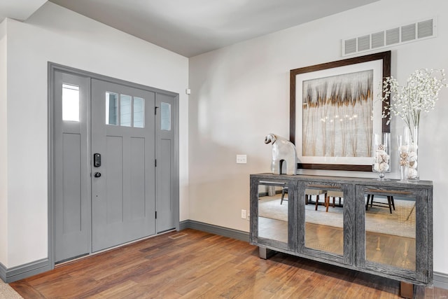 foyer entrance featuring hardwood / wood-style floors