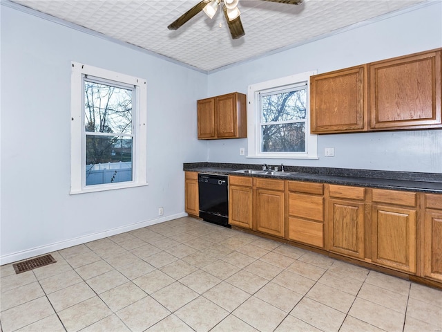 kitchen featuring ceiling fan, sink, light tile patterned floors, and black dishwasher