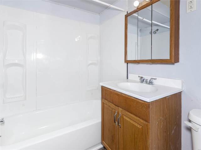 full bathroom featuring shower / tub combination, vanity, and toilet