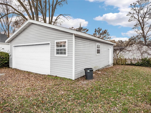 garage with a lawn