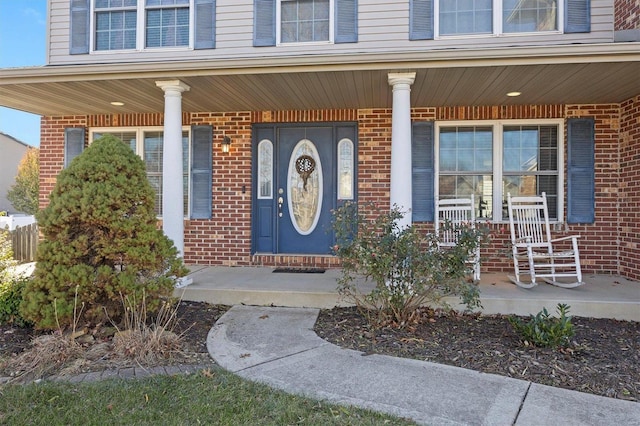 entrance to property with a porch