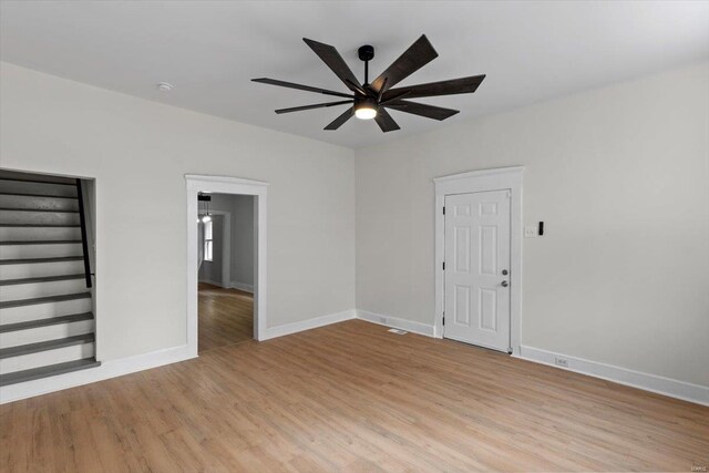 unfurnished room featuring ceiling fan and light hardwood / wood-style floors