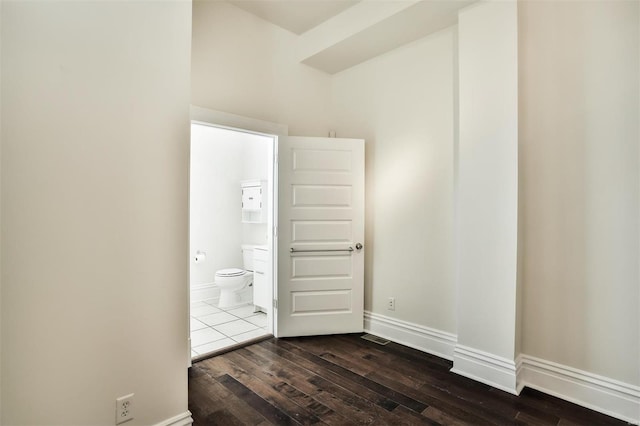 interior space with dark hardwood / wood-style flooring