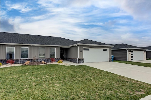 ranch-style house with a front yard and a garage