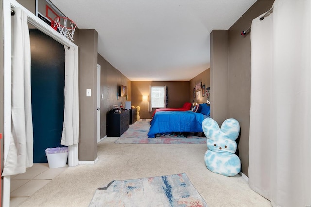 bedroom with light carpet