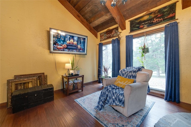 sitting room with hardwood / wood-style flooring, lofted ceiling with beams, and wooden ceiling