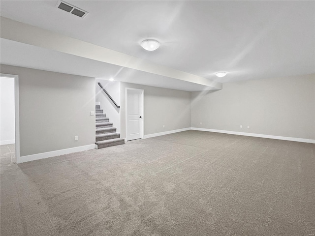 basement featuring carpet flooring