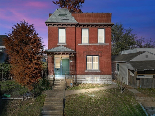 view of front of house featuring cooling unit