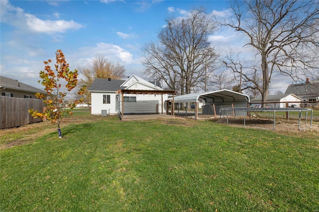 view of yard with a carport