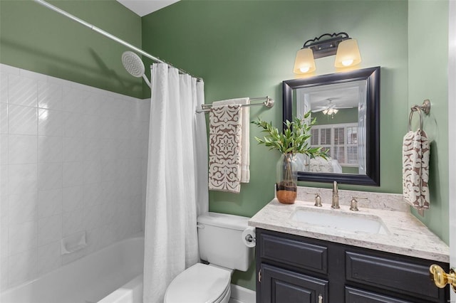 full bathroom with ceiling fan, vanity, shower / bath combo, and toilet