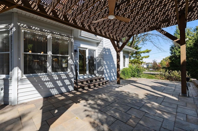 view of patio with ceiling fan, a pergola, and french doors