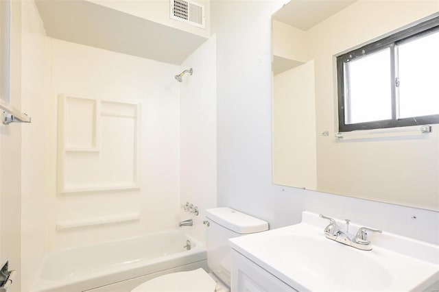 full bathroom with washtub / shower combination, vanity, and toilet