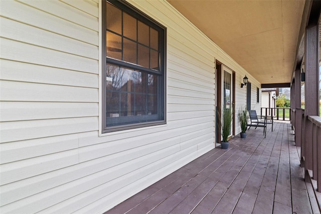 deck featuring covered porch