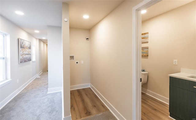 hallway featuring light wood-type flooring