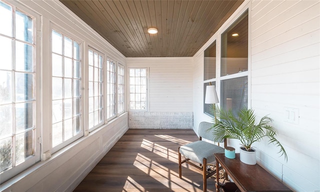 sunroom / solarium with a wealth of natural light and wooden ceiling