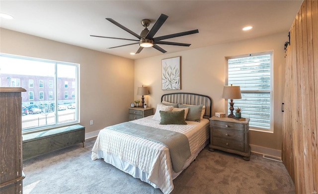 bedroom featuring ceiling fan and carpet floors