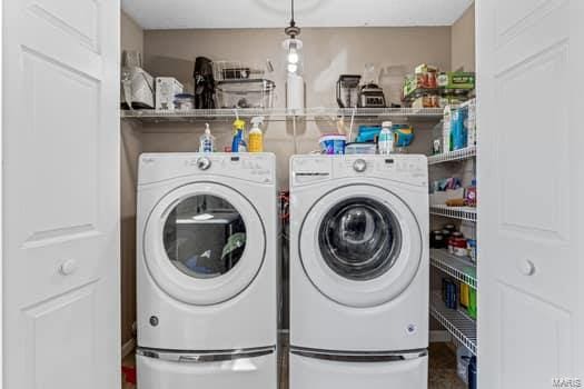 laundry area with washer and clothes dryer