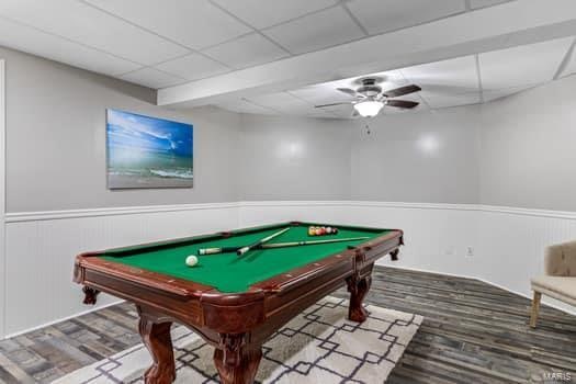 rec room featuring wood-type flooring, a drop ceiling, ceiling fan, and billiards