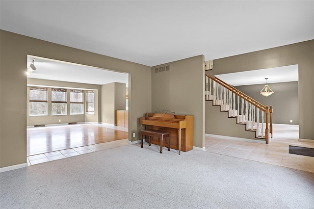 interior space featuring light colored carpet