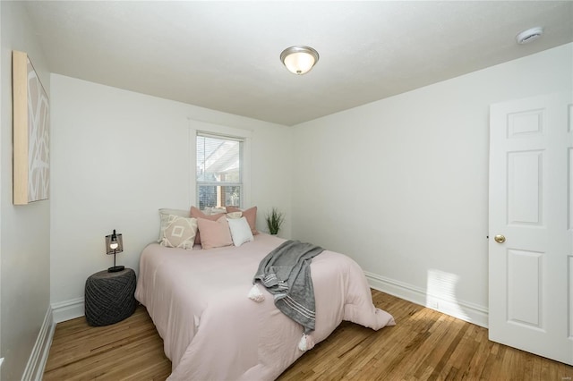 bedroom featuring light hardwood / wood-style flooring