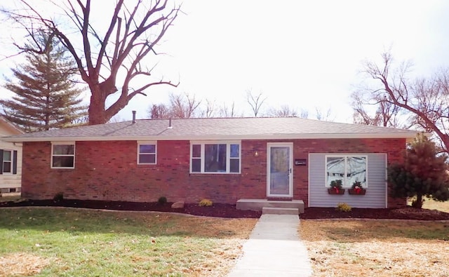 ranch-style home with a front yard