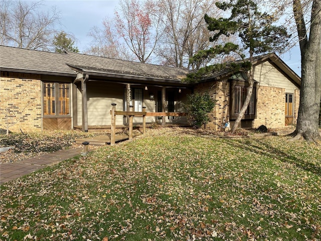 view of front of home with a front yard