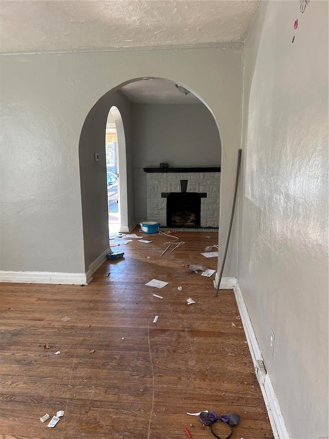 hall featuring dark wood-type flooring