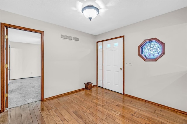 foyer entrance featuring light wood-type flooring