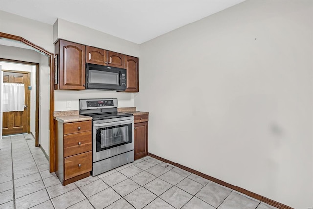 kitchen featuring stainless steel electric stove