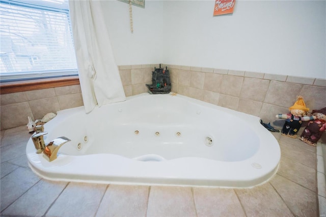 bathroom with tiled bath