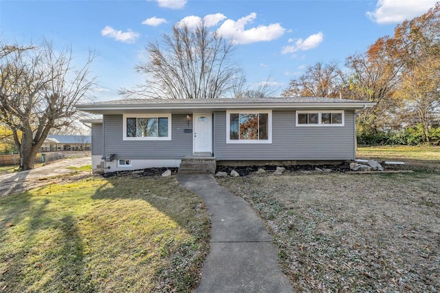 view of front of house with a front lawn