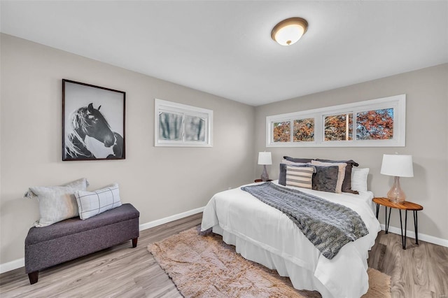 bedroom featuring hardwood / wood-style flooring