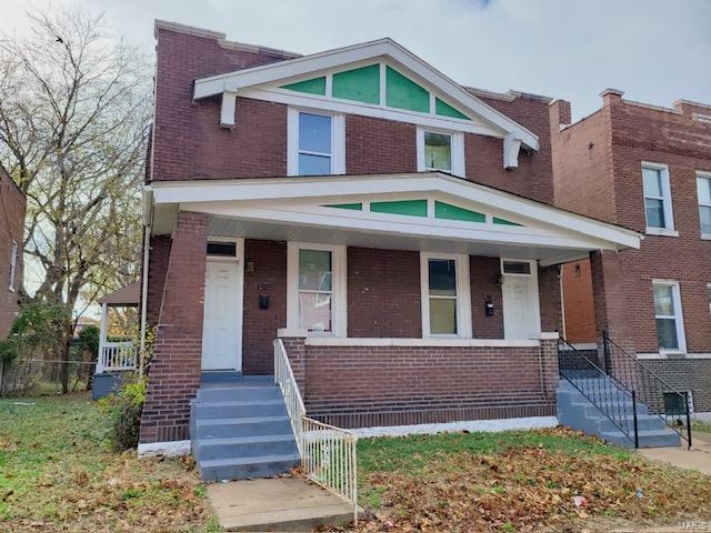 view of front of home featuring covered porch