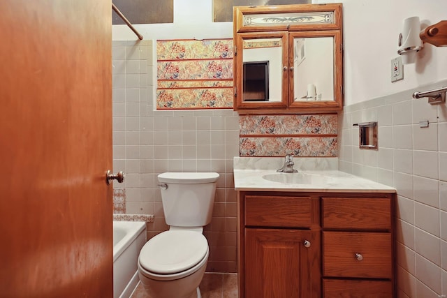 full bathroom featuring vanity, bathtub / shower combination, tile walls, and toilet